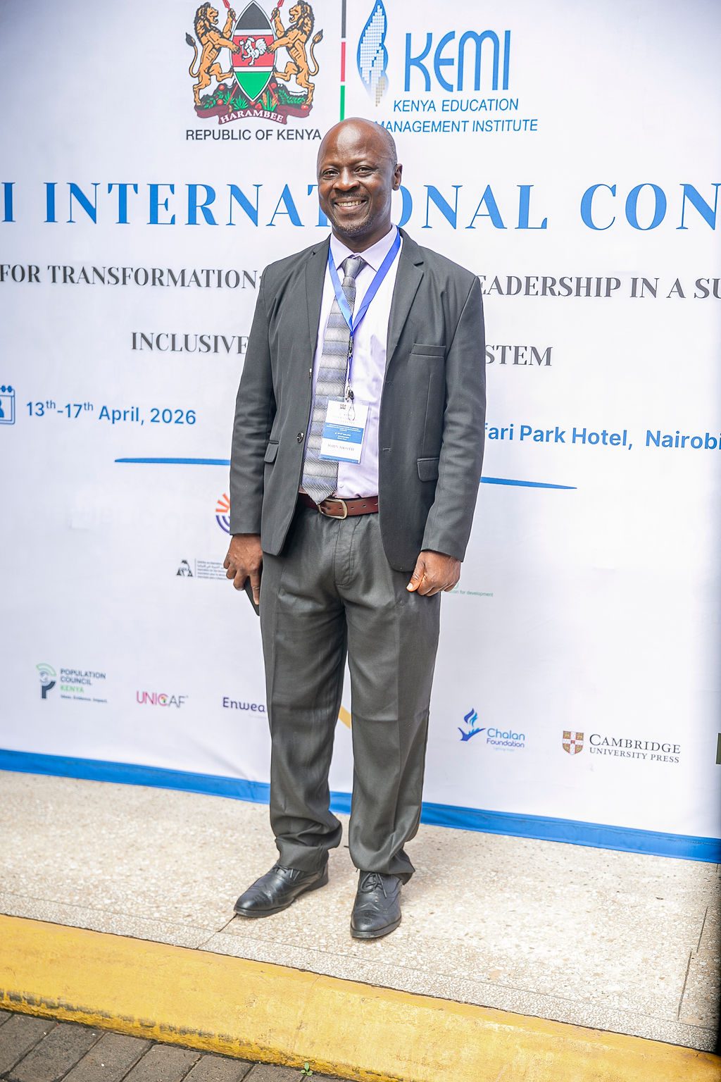 Delegate at the 1st KEMI International Conference banner, Safari Park Hotel Nairobi
